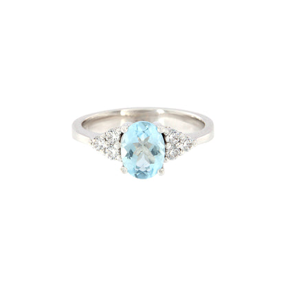 18ct gold Aquamarine and zircons ring